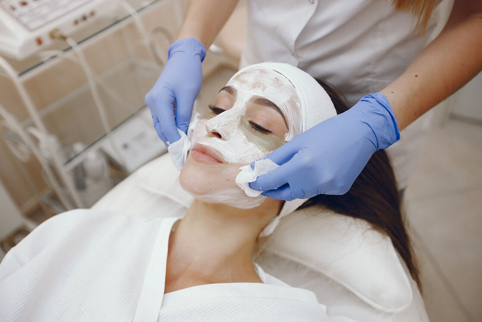 A woman receiving a cosmetic treatment at a cosmetology studio, showcasing some of the hottest aesthetic treatments.